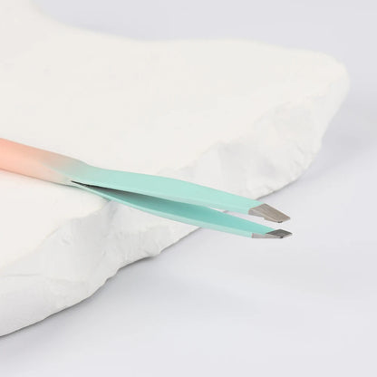 DUAL-END EYEBROW TWEEZERS WITH SPOOLIE